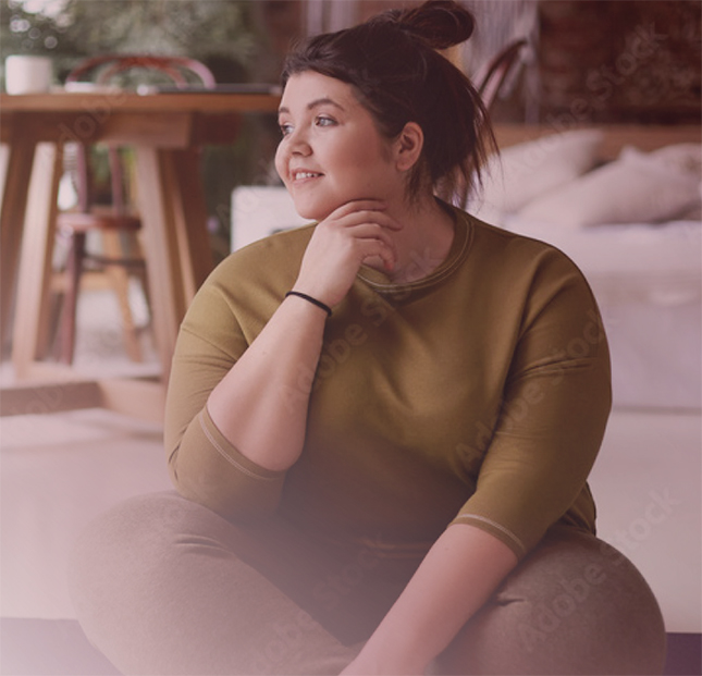 Woman sitting and smiling