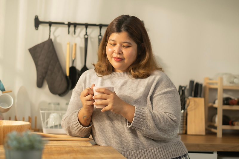 Woman holding coffee