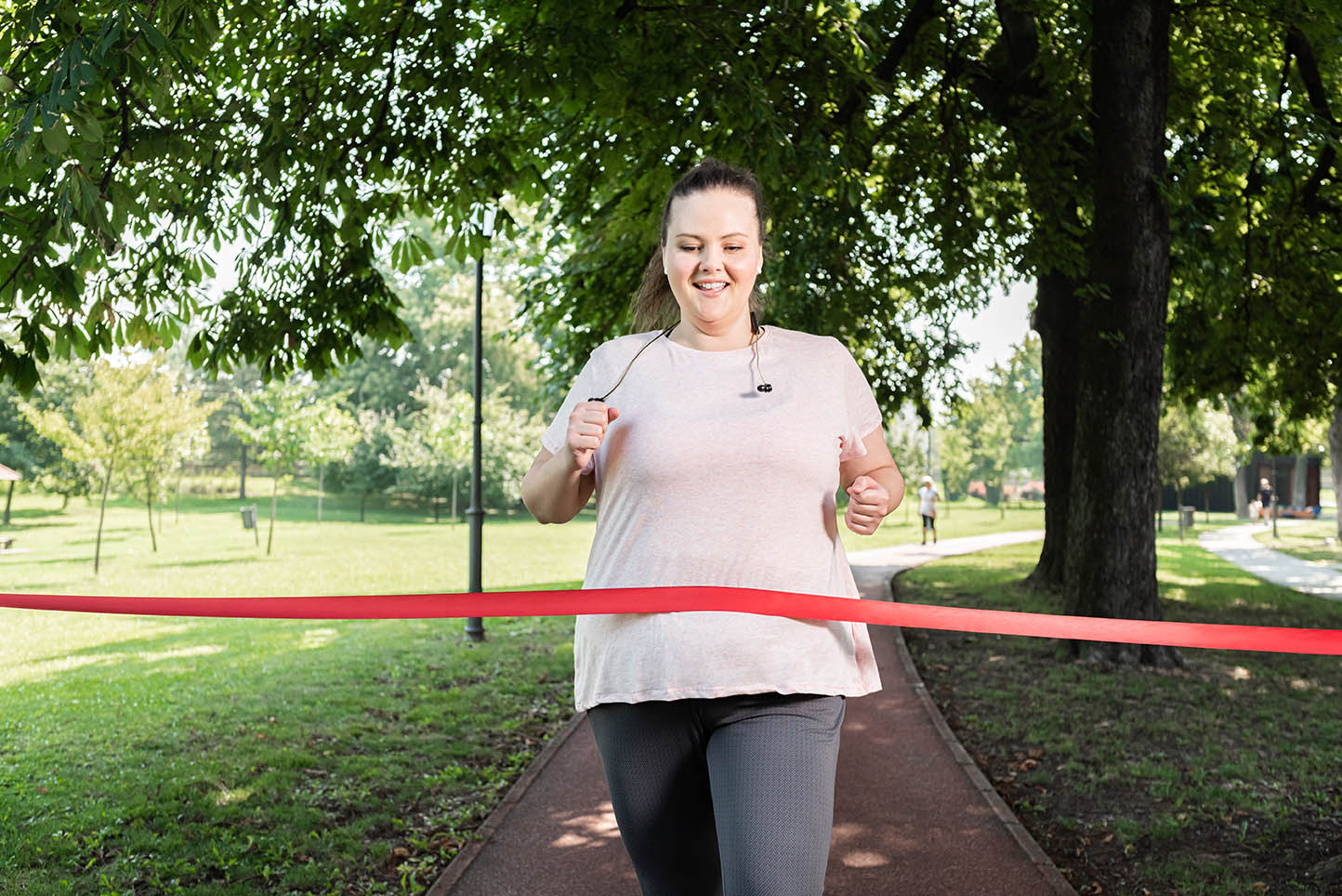 woman crossing finish line